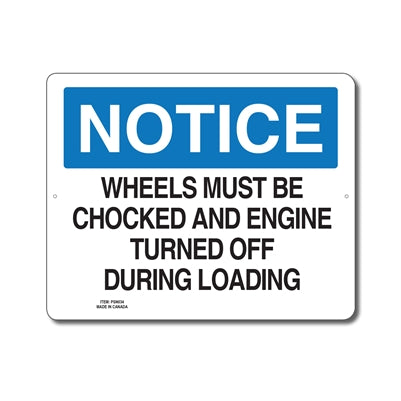 WHEELS MUST BE CHOCKED AND ENGINE TURNED OFF DURING LOADING - NOTICE SIGN